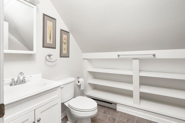 bathroom with a baseboard radiator, vanity, toilet, and vaulted ceiling