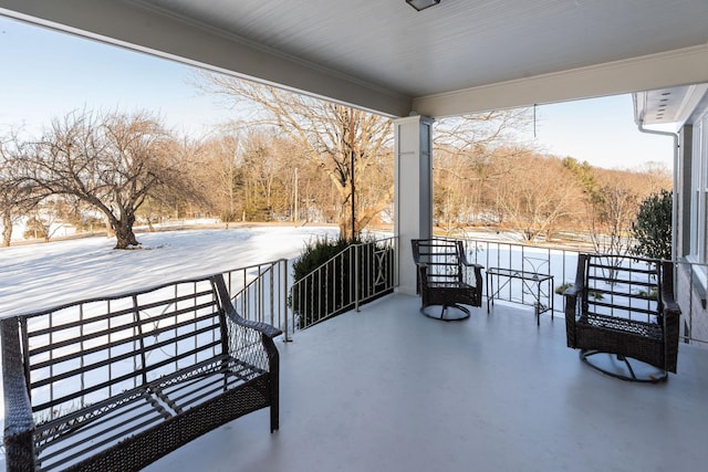 view of snow covered patio