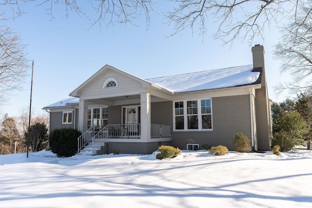 single story home with covered porch