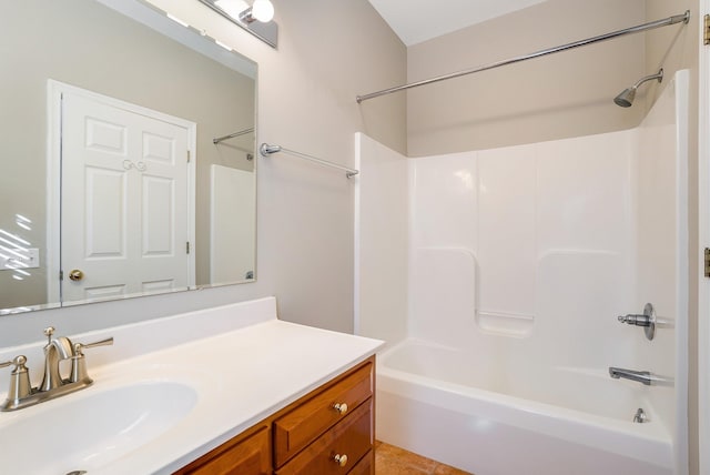 bathroom featuring vanity, tile patterned flooring, and shower / bath combination