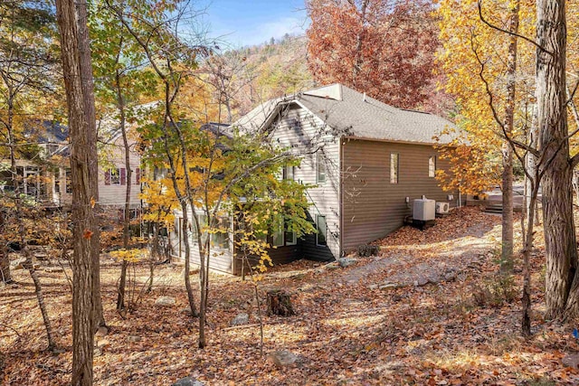 view of home's exterior featuring cooling unit