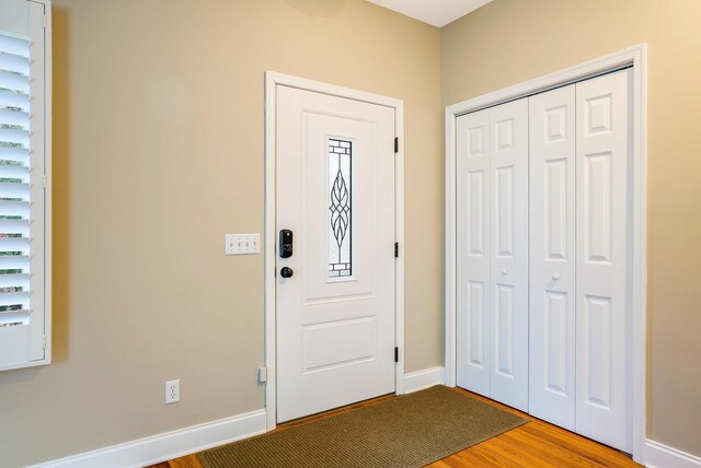 foyer with hardwood / wood-style floors