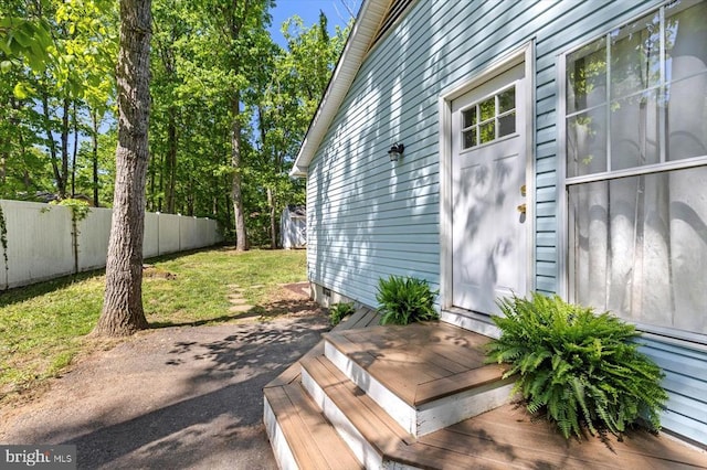 exterior space featuring fence and a patio area