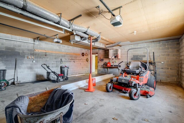 garage featuring a garage door opener