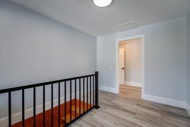 hallway featuring light wood-type flooring