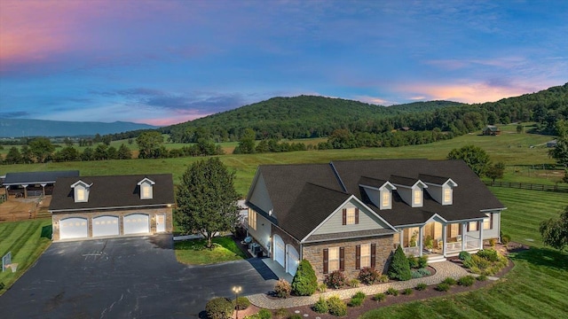 cape cod home with a mountain view