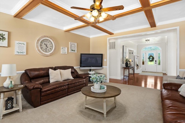 living room featuring crown molding, coffered ceiling, and beam ceiling