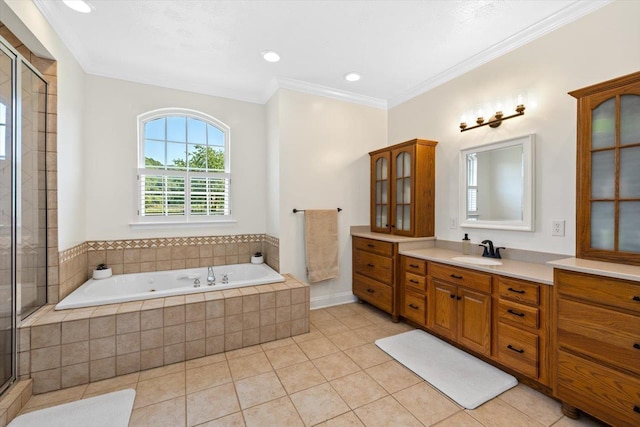 bathroom with ornamental molding, shower with separate bathtub, vanity, and tile patterned floors