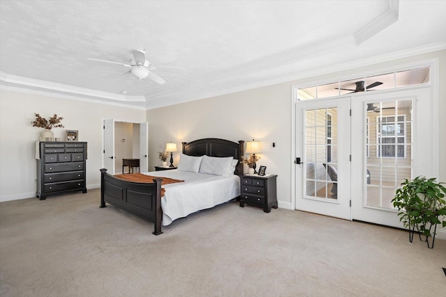 bedroom featuring light carpet, access to outside, ornamental molding, and a raised ceiling