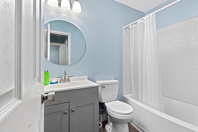 full bathroom featuring vanity, toilet, and shower / bath combo