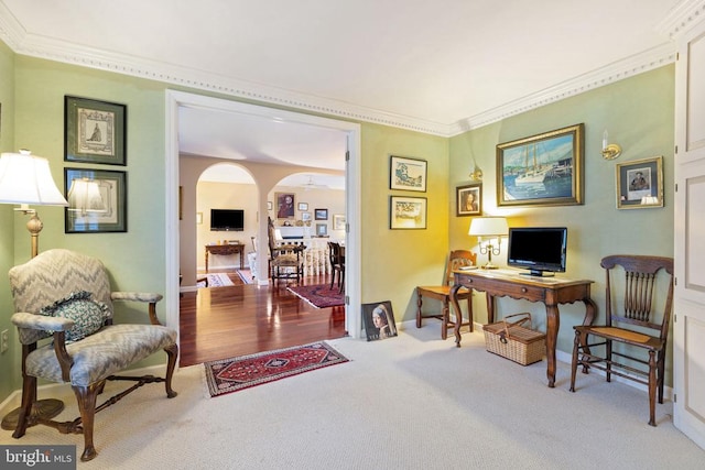 home office with ornamental molding and carpet floors