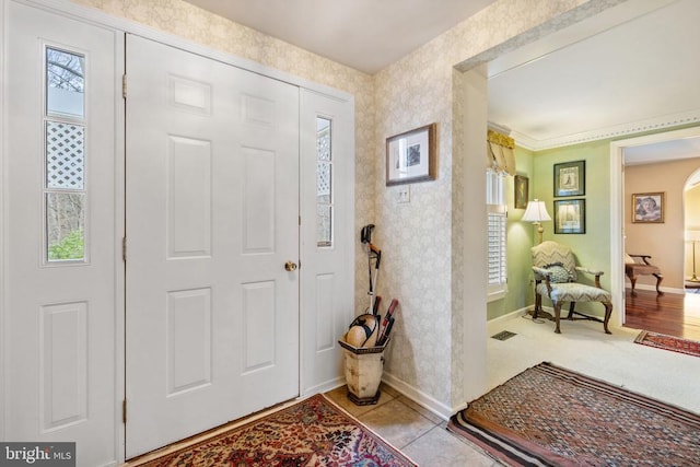 entryway featuring light tile patterned flooring