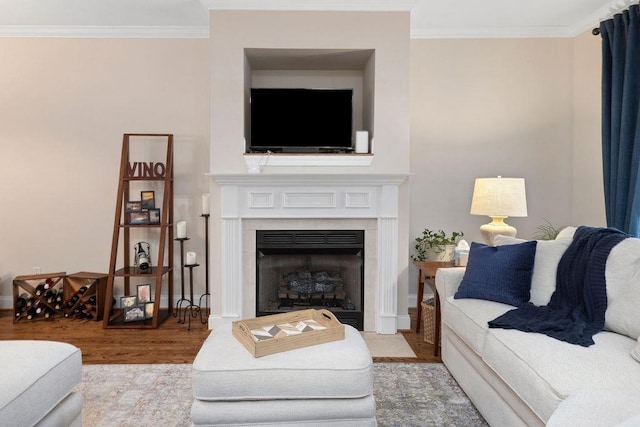 living room featuring ornamental molding and hardwood / wood-style floors