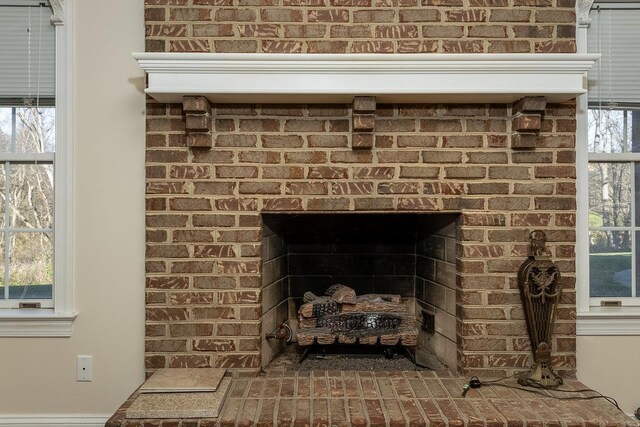 details with a brick fireplace