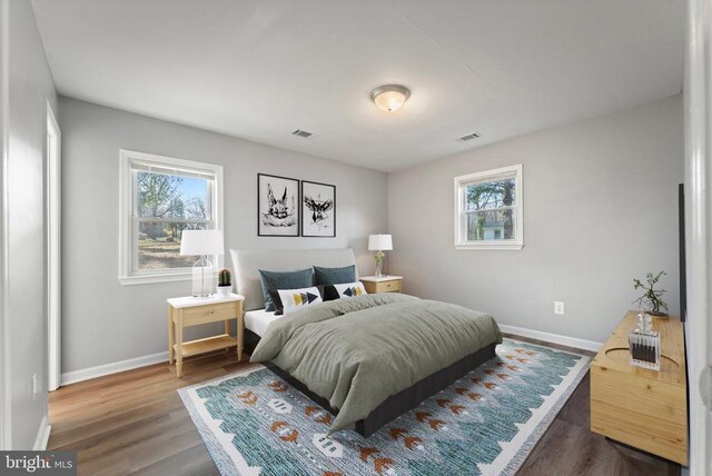 bedroom featuring wood-type flooring