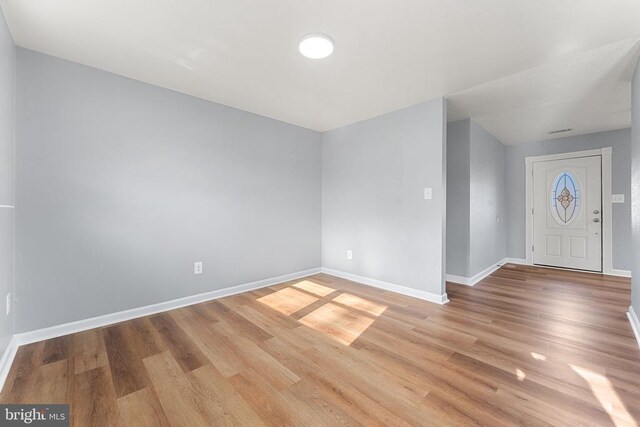 entrance foyer featuring light wood-type flooring