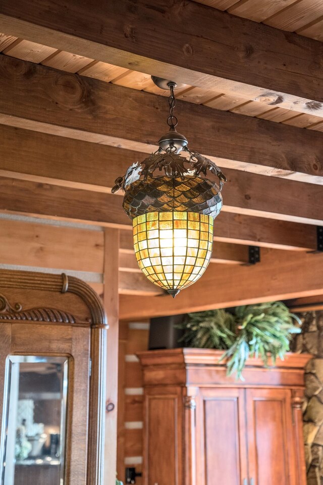 interior details featuring wood ceiling and beam ceiling