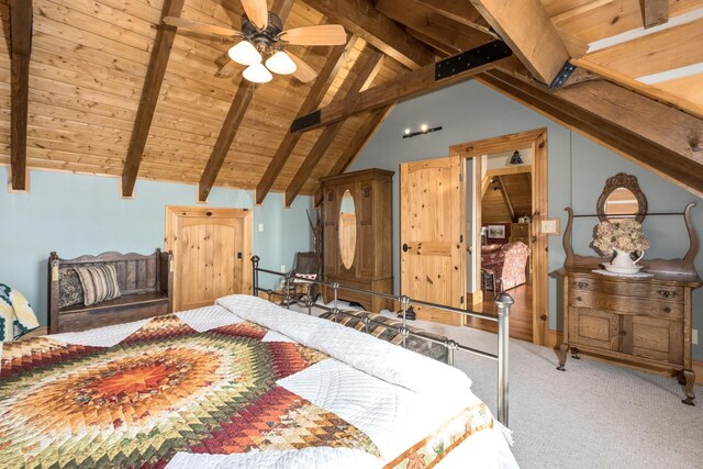 carpeted bedroom featuring wood ceiling and lofted ceiling with beams