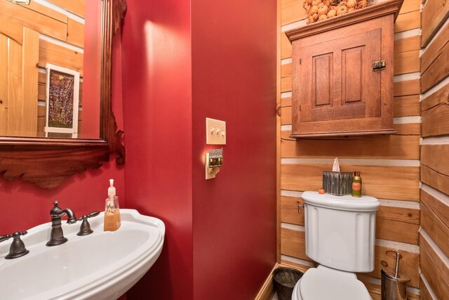 bathroom with sink and toilet