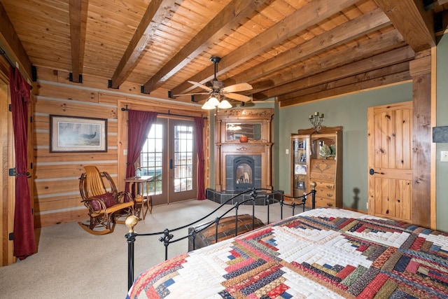 bedroom featuring beamed ceiling, carpet floors, access to exterior, wood ceiling, and french doors