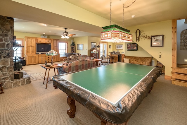 recreation room featuring ceiling fan, billiards, and light carpet