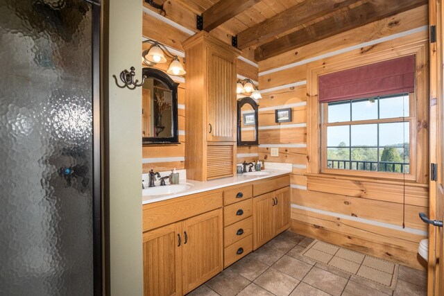 bathroom featuring beamed ceiling, vanity, wooden walls, and a shower with shower door