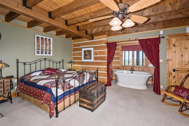 carpeted bedroom with wood ceiling and beam ceiling