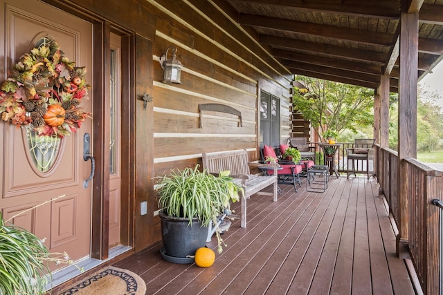 deck featuring covered porch