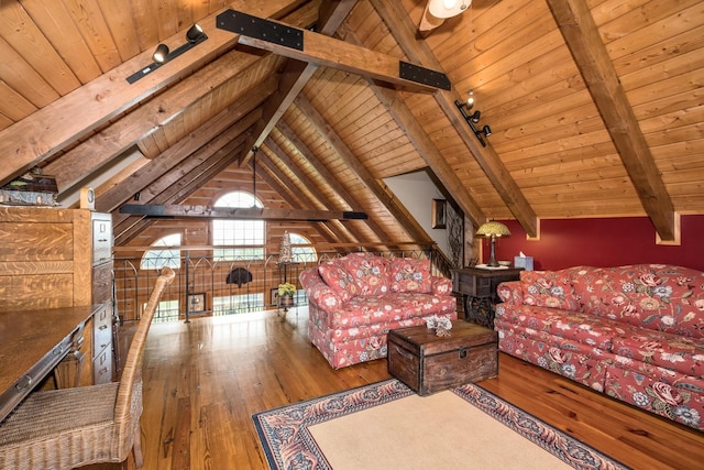 unfurnished living room with vaulted ceiling with beams, wood ceiling, track lighting, and hardwood / wood-style floors