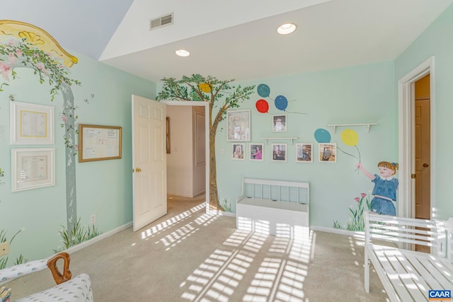 unfurnished bedroom with recessed lighting, lofted ceiling, visible vents, carpet flooring, and baseboards