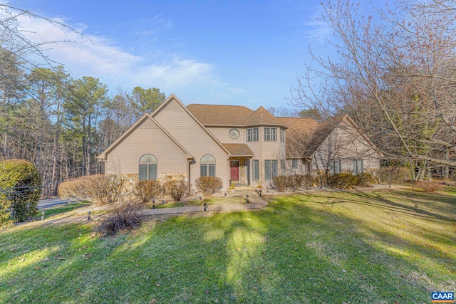 view of front of home with a front yard