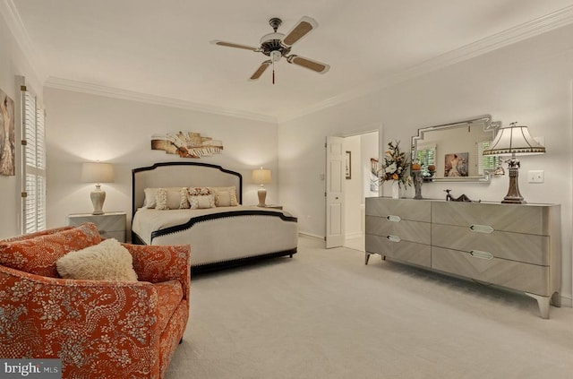bedroom featuring crown molding, baseboards, ceiling fan, and light carpet