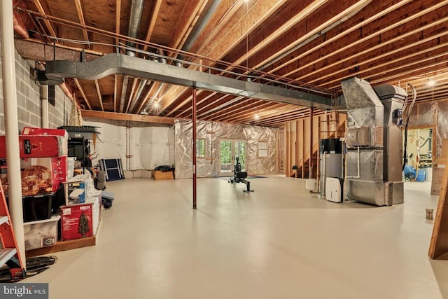 below grade area with heating unit and water heater