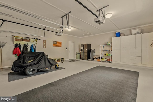 garage featuring stainless steel fridge with ice dispenser and a garage door opener