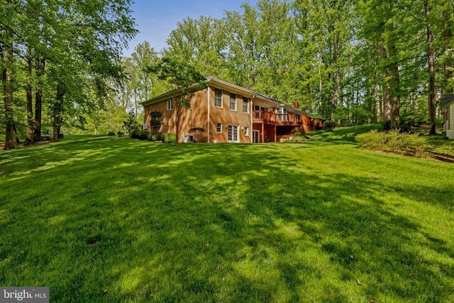 view of yard featuring a deck