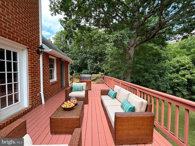 deck featuring outdoor lounge area