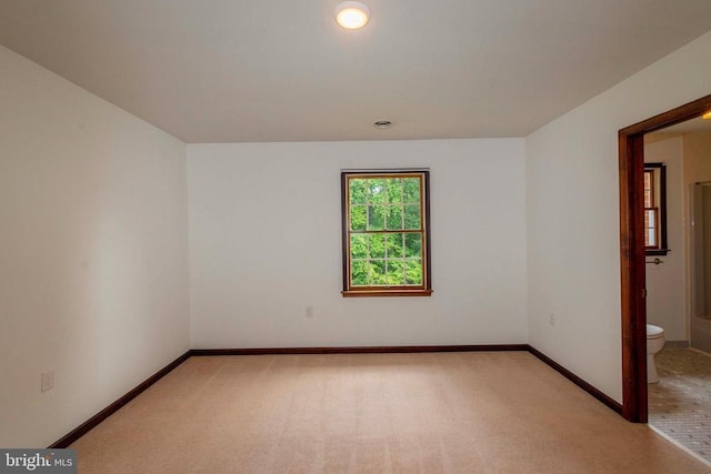 view of carpeted spare room