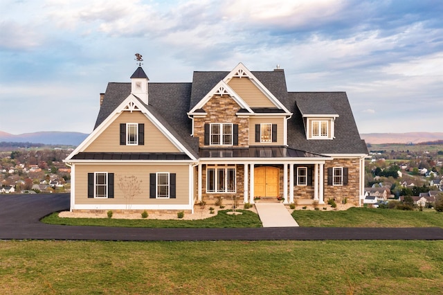 view of front of home with a front lawn