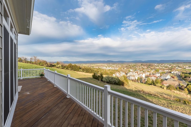 wooden terrace featuring a mountain view