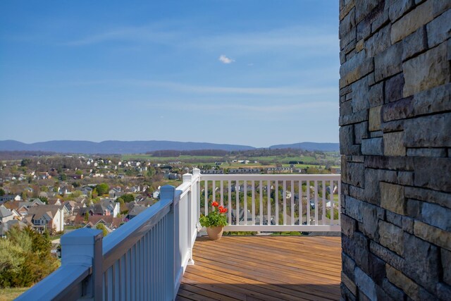 wooden terrace with a mountain view