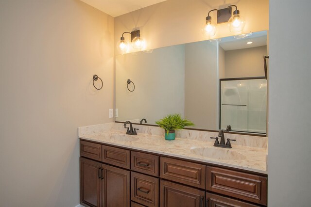 bathroom featuring vanity and walk in shower