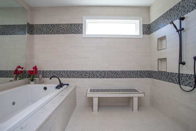 bathroom with tiled bath