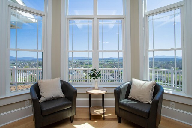 interior space with a mountain view and a healthy amount of sunlight