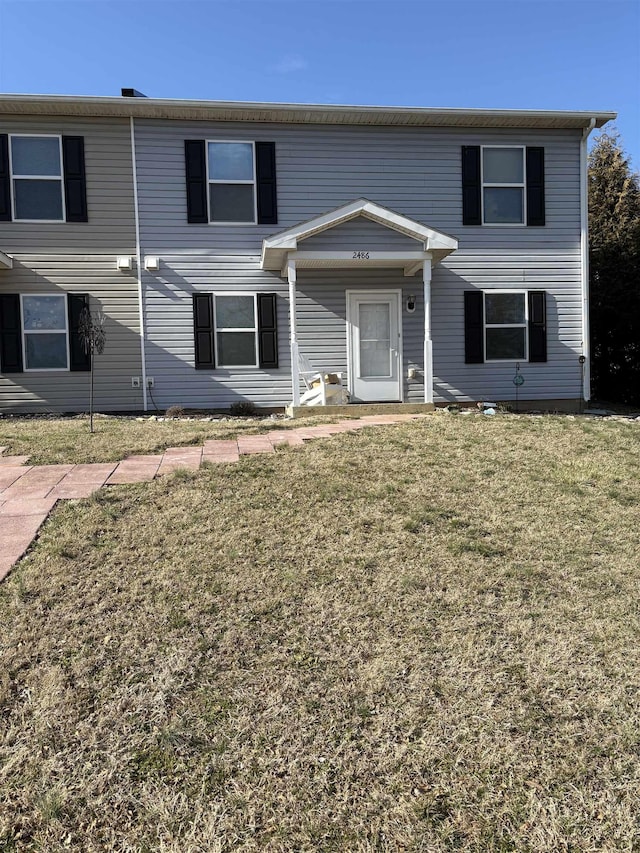 view of front facade with a front yard