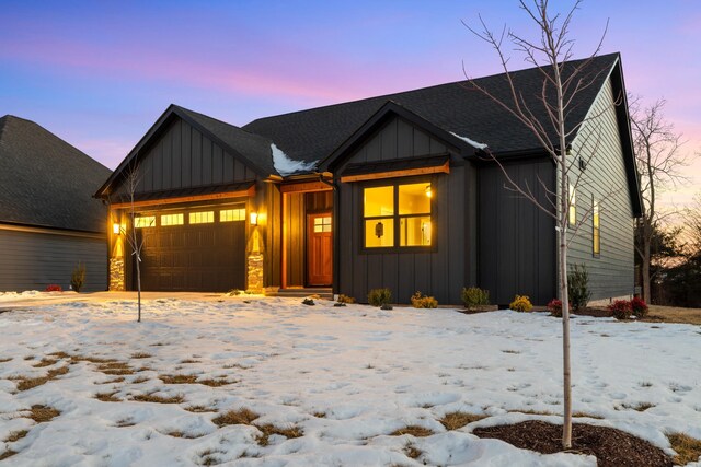 view of front of property featuring a garage