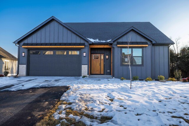 modern farmhouse style home with a garage