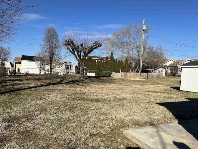 view of yard with fence