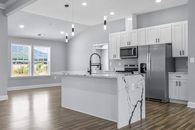 kitchen featuring stainless steel appliances, sink, a center island with sink, and white cabinets