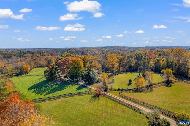 birds eye view of property with a rural view