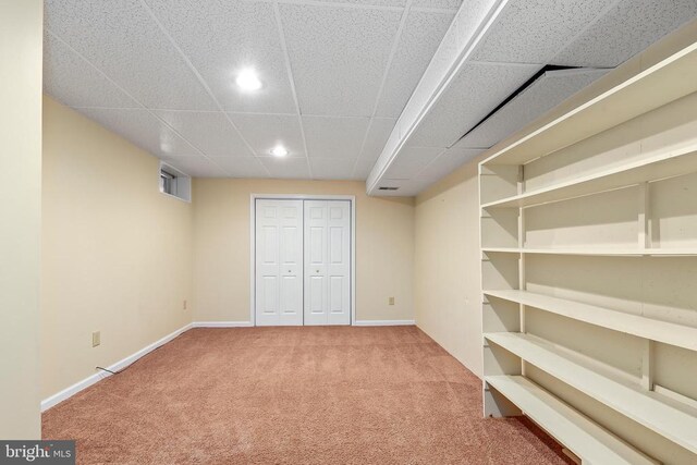 interior space with recessed lighting, baseboards, carpet floors, and a closet